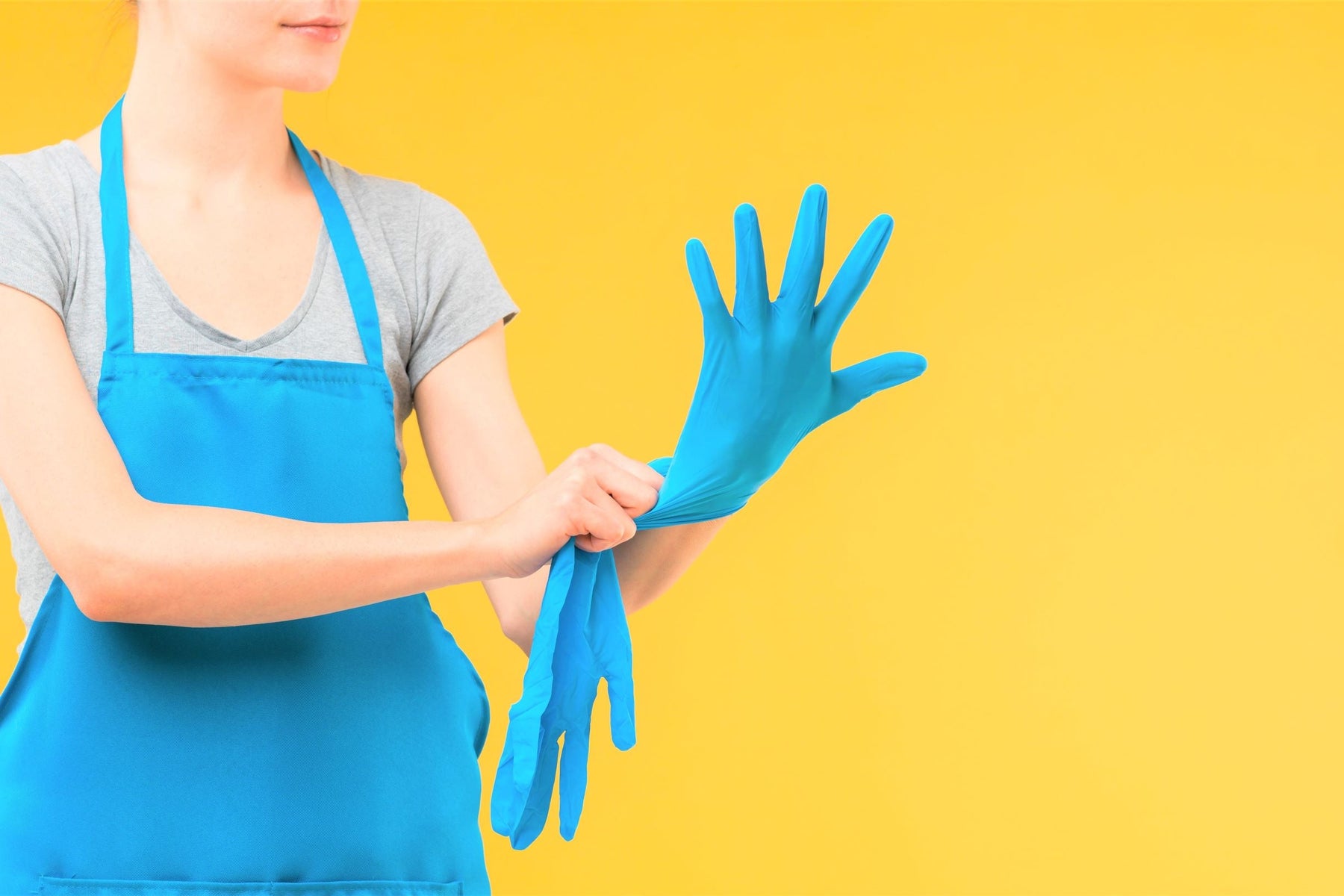 Blue Stretch Vinyl Gloves used for household cleaning